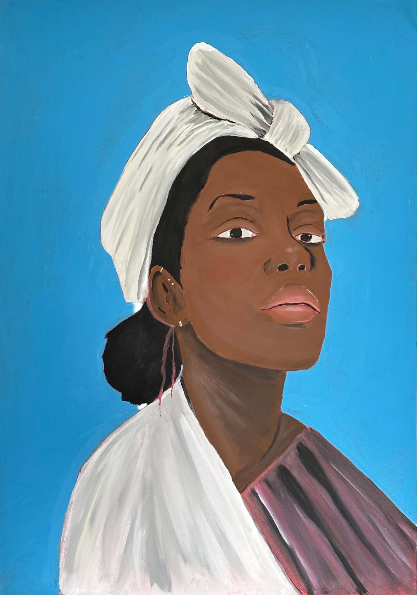 Portrait einer Frau mit dunkler Hautfarbe.